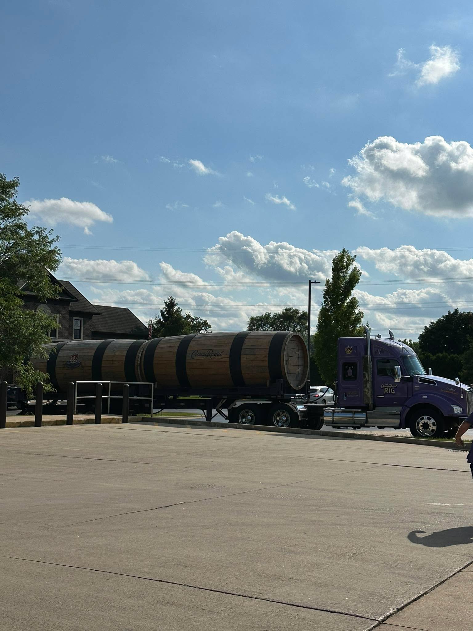 Stopped for gas and see crown royal barrels on a truck.